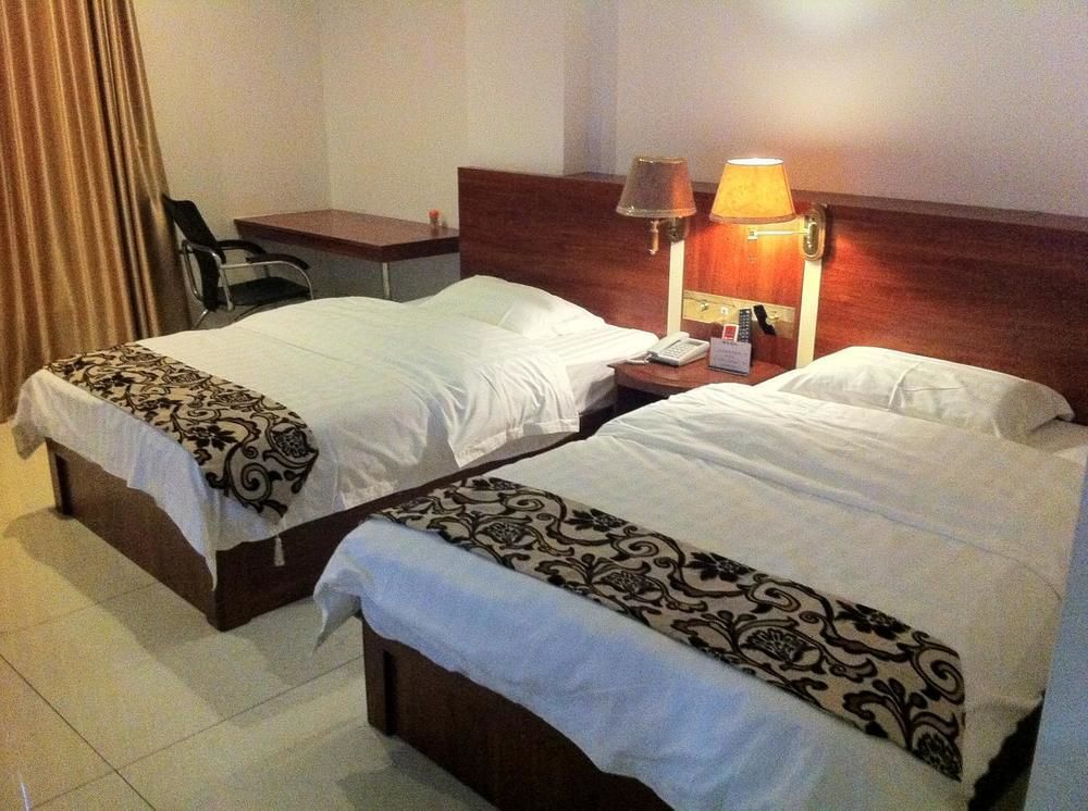 Guoxing Business Hotel จ้าวชิง ภายนอก รูปภาพ