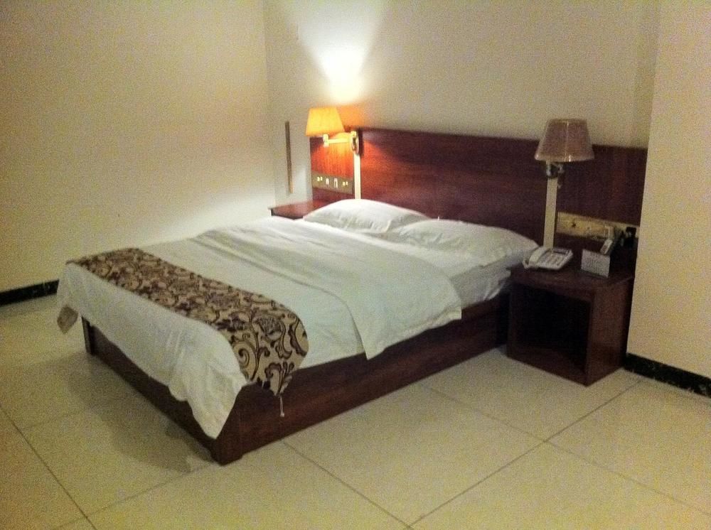 Guoxing Business Hotel จ้าวชิง ภายนอก รูปภาพ