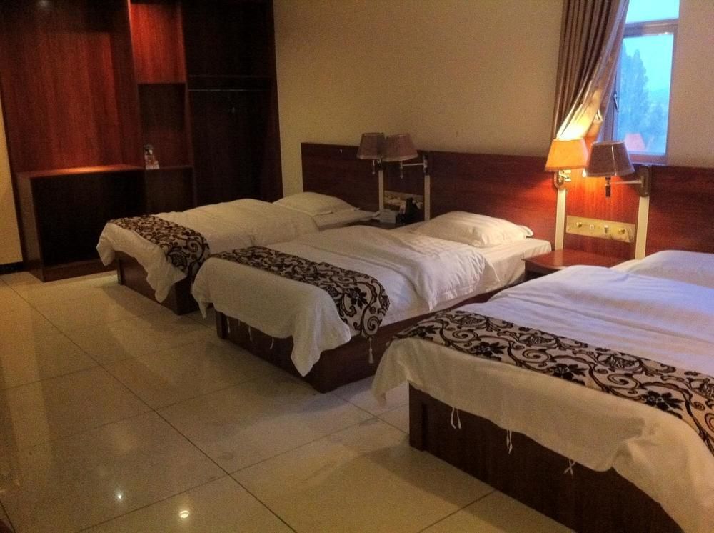 Guoxing Business Hotel จ้าวชิง ภายนอก รูปภาพ
