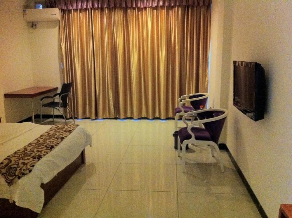 Guoxing Business Hotel จ้าวชิง ภายนอก รูปภาพ